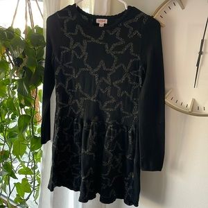Cute long-sleeve knit black dress with gold star details